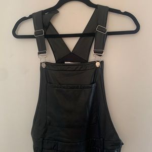 vegan leather wide-ish legged overalls